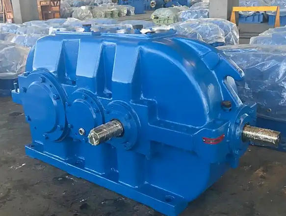 What load characteristics should be considered when selecting the appropriate number of gearbox stages for specific application scenarios
