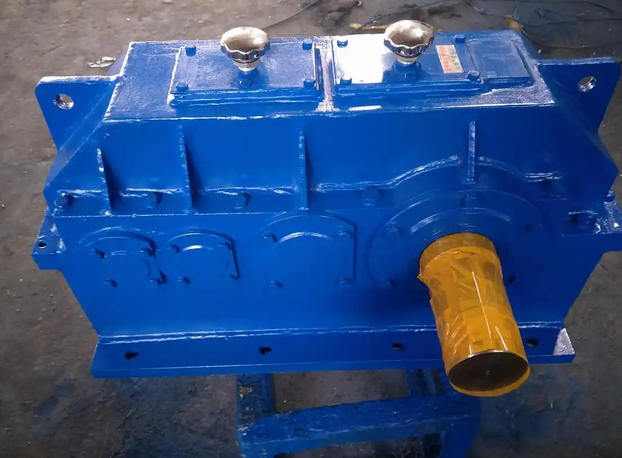 What are the steps for the on load trial operation of ZSY series hard tooth surface gear reducer